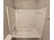 Bright and functional bathroom with a shower and tub combination and neutral tile at 6406 Laurel Post Dr, Lithonia, GA 30058