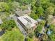 Beautiful aerial view of an industrial property with brick exterior, surrounded by mature trees and lush greenery at 1065 United Ave # 208, Atlanta, GA 30316