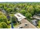 Overhead view of the building roof showing architectural detail, green trees and neighborhood at 1065 United Ave # 208, Atlanta, GA 30316