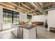 Bright kitchen with stainless steel appliances, large windows, and an island with bar seating at 1065 United Ave # 208, Atlanta, GA 30316