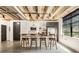 Kitchen featuring modern appliances, sleek cabinets, and a kitchen island with bar stool seating at 1065 United Ave # 208, Atlanta, GA 30316