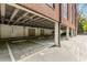 Reserved parking area in the building with clearly marked spaces and covered structure at 1065 United Ave # 208, Atlanta, GA 30316