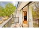 Balcony with trees and landscaping and an entrance to the unit at 2303 Pine Heights Ne Dr, Atlanta, GA 30324