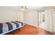 Hardwood bedroom offering access to a sliding glass door and connecting room at 2303 Pine Heights Ne Dr, Atlanta, GA 30324