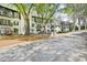 Street view of building showcasing maintained yard and mature shade trees at 2303 Pine Heights Ne Dr, Atlanta, GA 30324