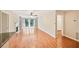 Spacious living room featuring hardwood floors, a cozy fireplace, and natural light from the sliding glass door at 2303 Pine Heights Ne Dr, Atlanta, GA 30324