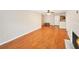 Inviting living room features hardwood floors, fireplace, and an open layout connecting to the kitchen at 2303 Pine Heights Ne Dr, Atlanta, GA 30324