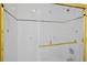 Shower featuring glass doors and gold trim at 2303 Pine Heights Ne Dr, Atlanta, GA 30324