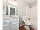 This bathroom has a white vanity, a shower-tub, and neutral-colored walls at 2938 Parkwood Rd, Snellville, GA 30039