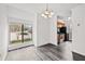 Dining area next to the kitchen and a large window creating a great open layout at 49 Country Ct, Alpharetta, GA 30005