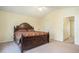 Bedroom featuring vaulted ceiling, and a beautifully decorated bed at 7324 Drake Ave, Lithonia, GA 30058