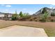 Large, empty backyard with a concrete slab ready for customization or expansion at 765 Rock Ln, Mcdonough, GA 30253