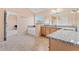 Spacious bathroom featuring double sinks, tile floor, and separate tub with mosaic accent at 765 Rock Ln, Mcdonough, GA 30253