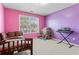 Bright bedroom with large window, colorful decor, and ample space for relaxation and personalization at 765 Rock Ln, Mcdonough, GA 30253