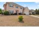 Traditional two-story home showcasing a lush front yard and inviting curb appeal at 765 Rock Ln, Mcdonough, GA 30253