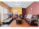 Comfortable living room with cozy seating and natural light at 765 Rock Ln, Mcdonough, GA 30253