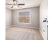 Neutral bedroom featuring a window and light neutral carpet at 1092 Shumard Ln, Mcdonough, GA 30252