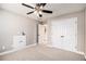 Bedroom with ceiling fan and double closet at 1092 Shumard Ln, Mcdonough, GA 30252