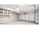 The garage has painted walls, sealed floor and an automatic door at 1092 Shumard Ln, Mcdonough, GA 30252