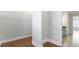 Walk-in closet with wood floors and wire shelving at 25 Mountain Crest Dr, Oxford, GA 30054