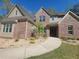 Attractive two-story brick home with landscaped walkway leading to the front door at 25 Mountain Crest Dr, Oxford, GA 30054
