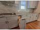 Kitchen with a cooktop, granite countertops, and pull out shelves at 25 Mountain Crest Dr, Oxford, GA 30054