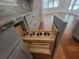 Kitchen cabinet pull-out drawer with storage for stainless steel cookware at 25 Mountain Crest Dr, Oxford, GA 30054