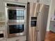 Kitchen features stainless steel oven, microwave, and refrigerator at 25 Mountain Crest Dr, Oxford, GA 30054