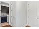 Convenient laundry area with dark cabinets, granite countertops, and washer/dryer hookups at 25 Mountain Crest Dr, Oxford, GA 30054