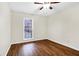 Bedroom featuring hardwood floors, ceiling fan and natural light at 1166 Booth Sw Rd # 605, Marietta, GA 30008