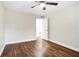 Bedroom featuring hardwood floors, ceiling fan and a walk-in closet at 1166 Booth Sw Rd # 605, Marietta, GA 30008