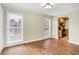 Dining room with laminate floors and two windows at 1166 Booth Sw Rd # 605, Marietta, GA 30008