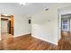 Living room with laminate floors and view of the kitchen at 1166 Booth Sw Rd # 605, Marietta, GA 30008