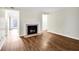 Living room with fireplace and laminate flooring at 1166 Booth Sw Rd # 605, Marietta, GA 30008
