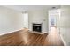 Living room with fireplace and laminate flooring at 1166 Booth Sw Rd # 605, Marietta, GA 30008