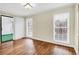 Sunroom with laminate floors and two windows at 1166 Booth Sw Rd # 605, Marietta, GA 30008