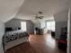Bright and airy bedroom with hardwood floors, comfortable bed, and ample closet space at 2469 Briar Knoll Rd, Lithonia, GA 30058