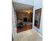 Inviting living room with tile flooring, a fireplace, and black and white accents at 2469 Briar Knoll Rd, Lithonia, GA 30058