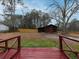 Large backyard with barn and privacy fence at 3844 Oglesby Rd, Powder Springs, GA 30127