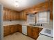 Functional kitchen featuring ample cabinets and laminate countertops at 3844 Oglesby Rd, Powder Springs, GA 30127