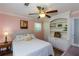 Inviting bedroom with custom built in shelves and natural light at 5369 Blue Grass Ln, Sugar Hill, GA 30518