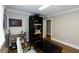 Home office with hardwood floors, neutral paint, and small closet for storage at 5369 Blue Grass Ln, Sugar Hill, GA 30518
