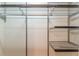 Walk-in closet with adjustable wire shelving for personalized storage solutions at 1015 Piedmont Ne Ave # A2, Atlanta, GA 30309