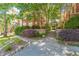 Charming exterior with well-maintained landscaping, lush greenery, and stone accents at 1015 Piedmont Ne Ave # A2, Atlanta, GA 30309