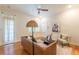 Inviting living room features hardwood floors, shutters, and a cozy seating arrangement at 1015 Piedmont Ne Ave # A2, Atlanta, GA 30309