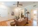 Comfortable living room featuring hardwood floors, built-in shelves, and open view to other rooms at 1015 Piedmont Ne Ave # A2, Atlanta, GA 30309