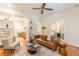 Cozy living room featuring hardwood floors, built-in bookshelves, and view into adjacent room through double doors at 1015 Piedmont Ne Ave # A2, Atlanta, GA 30309