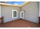 Back deck with gray siding on house and view of backyard at 1947 Maywood Nw Pl, Atlanta, GA 30318