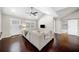 Spacious living area featuring vaulted ceilings and rich hardwood floors at 1947 Maywood Nw Pl, Atlanta, GA 30318
