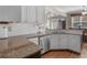 Kitchen featuring granite countertops, stainless steel appliances, and white cabinets at 355 Parker Rd, Covington, GA 30014